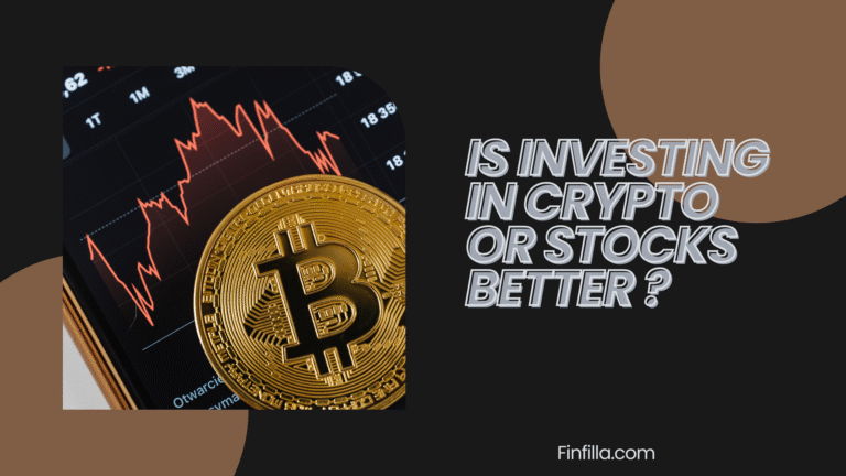 Alt text: "Bitcoin coin in front of a downward stock chart on a phone screen. Text asks, 'Is investing in crypto or stocks better?' on a dark background."